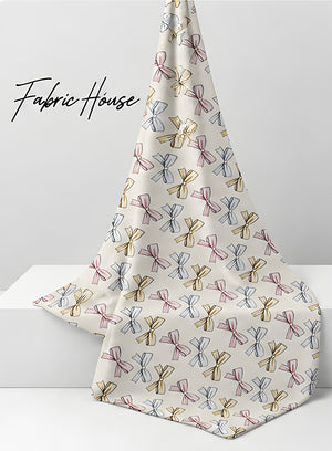 Cream Blue Repeating Motifs silk draped to show drape and sheen
