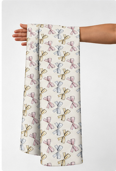 Cream Blue Repeating Motifs silk held in hand for scale