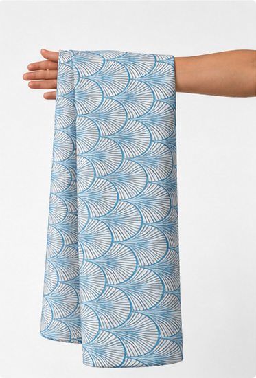 Blue White Ornamental Pattern silk held in hand for scale