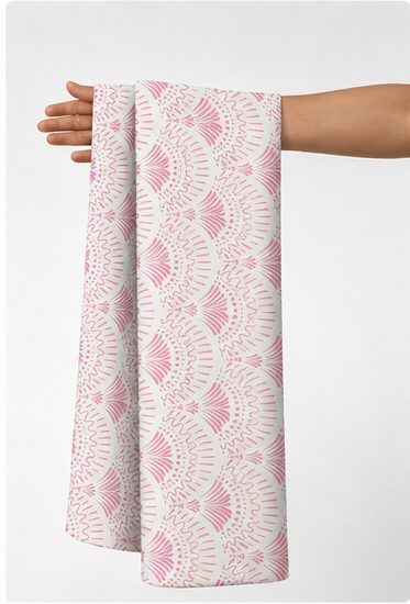 Soft Pink Minimal Motifs silk held in hand for scale