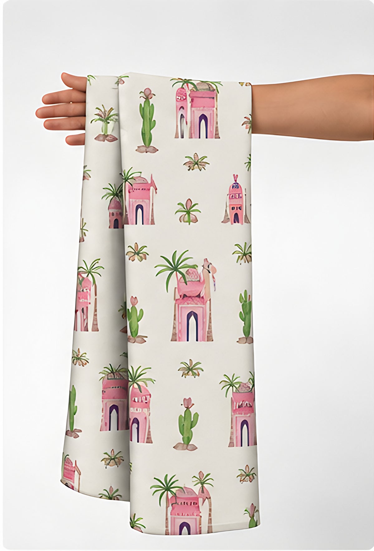 Pink Playful Illustrated Motifs silk held in hand for scale
