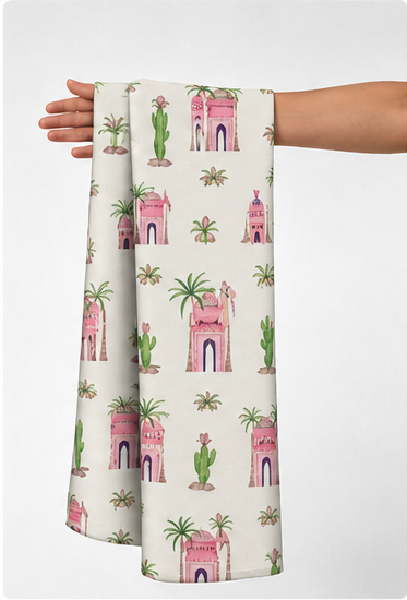 Pink Playful Illustrated Motifs silk held in hand for scale